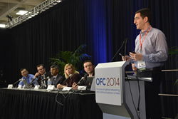 A panel at a Market Watch session at OFC 2014.