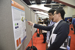 The poster session at OFC 2014.